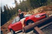 [Mom and a red car]
